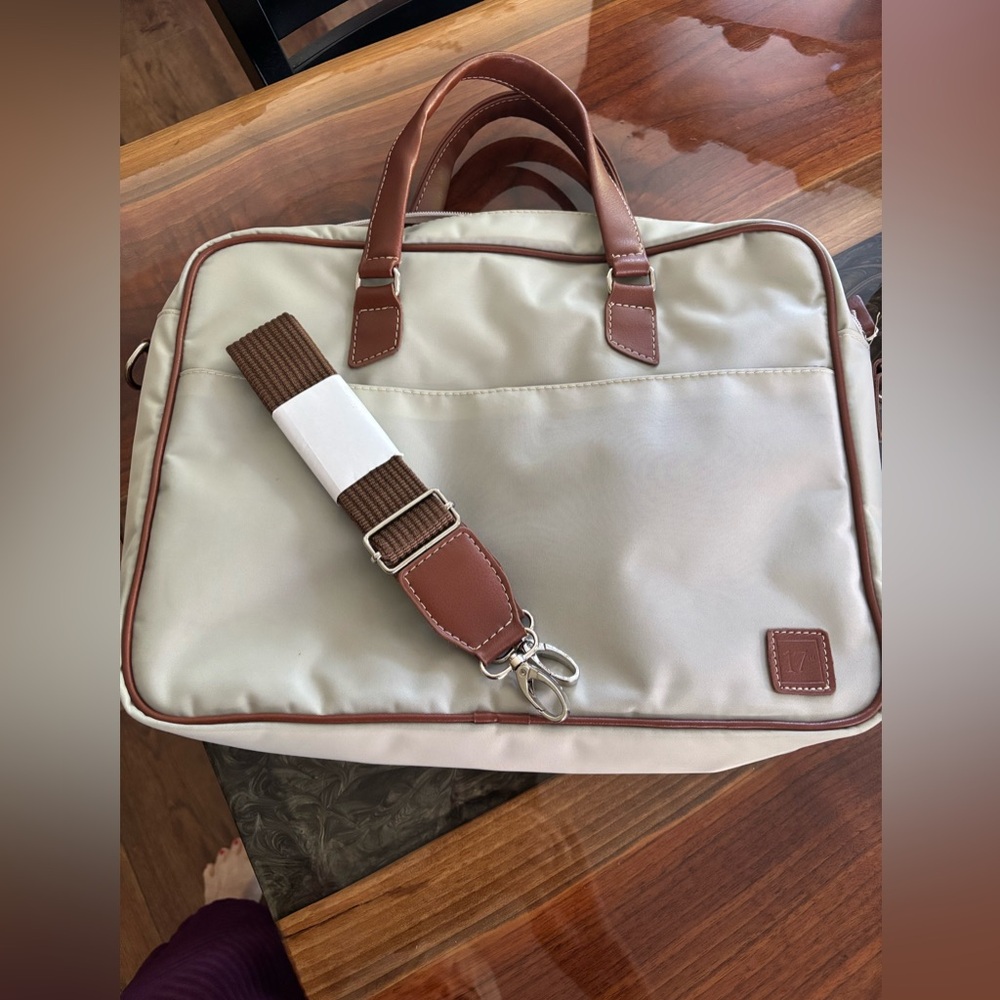 Travel bag great for laptop or as briefcase with magnetic outside pockets